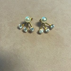 Gold pearl and cubic zirconia earrings.